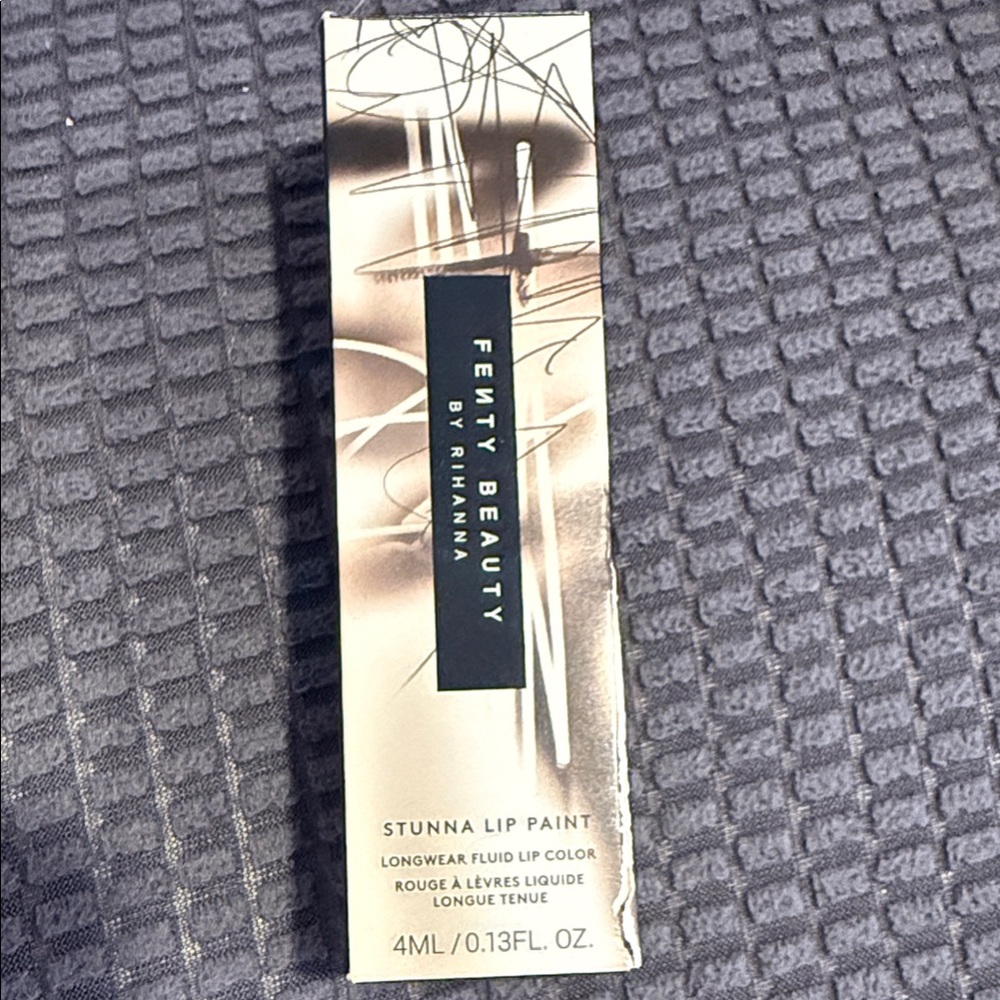 Fenty Beauty Stunna Lip Paint in Gold Packaging